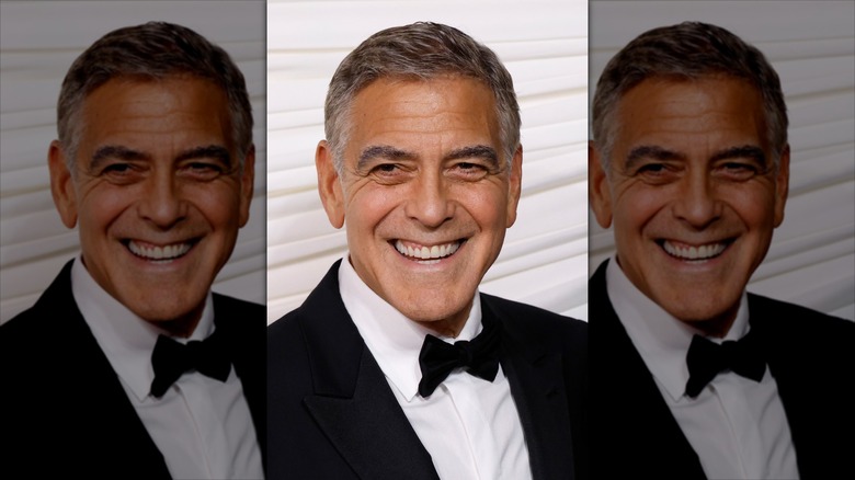 George Clooney smiles while wearing a tuxedo