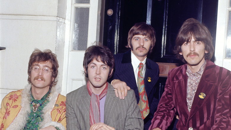 The Beatles posing for a photo in London on May 19, 1967 during a press party.