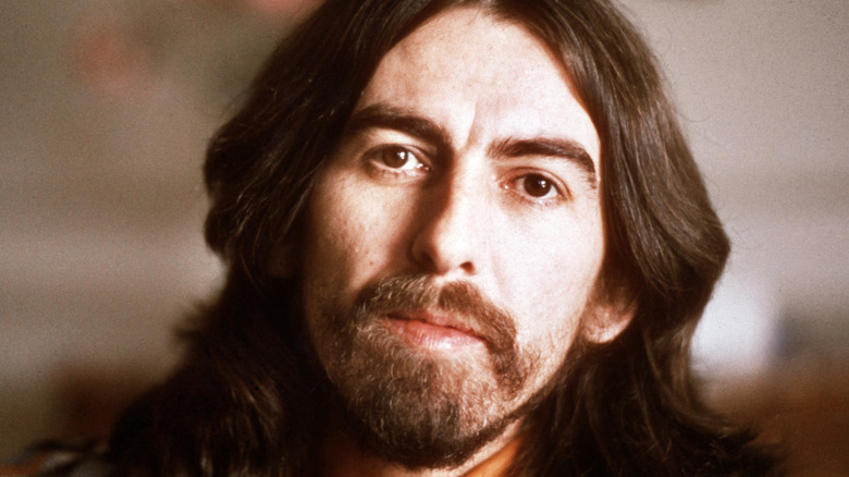 George Harrison posing