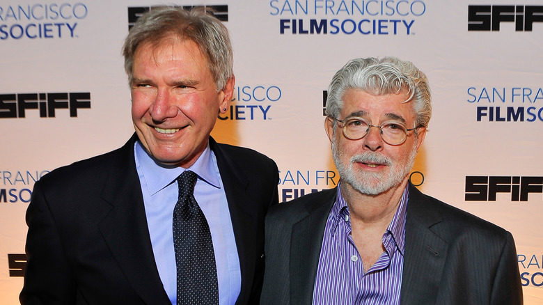 Harrison Ford and George Lucas posing at the 56th San Francisco Film Festival honoring Harrison Ford with the Peter J. Owens Award at Bimbo's 365 Club on May 7, 2013 in San Francisco, California.