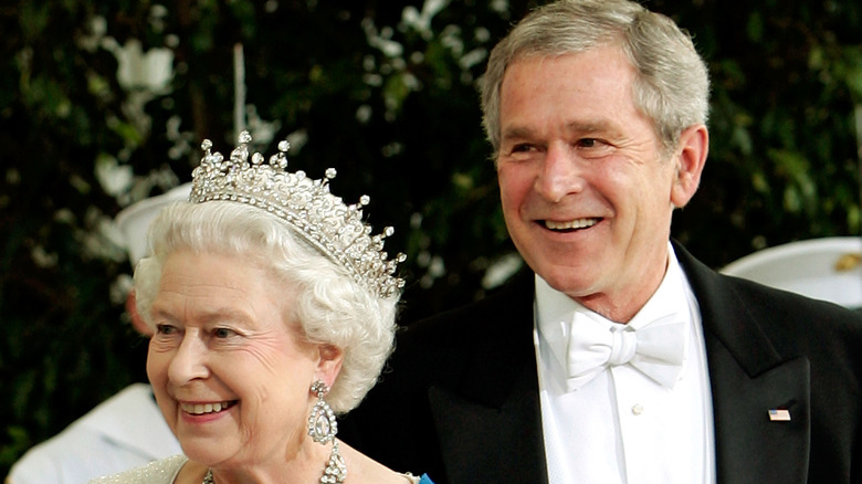 George W. Bush and Queen Elizabeth smiling