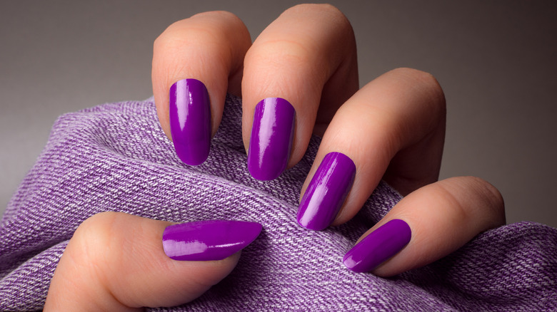 Purple nails on purple scarf