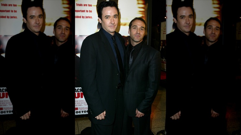 John Cusack and Jeremy Piven attending a premiere for the Runaway Jury.