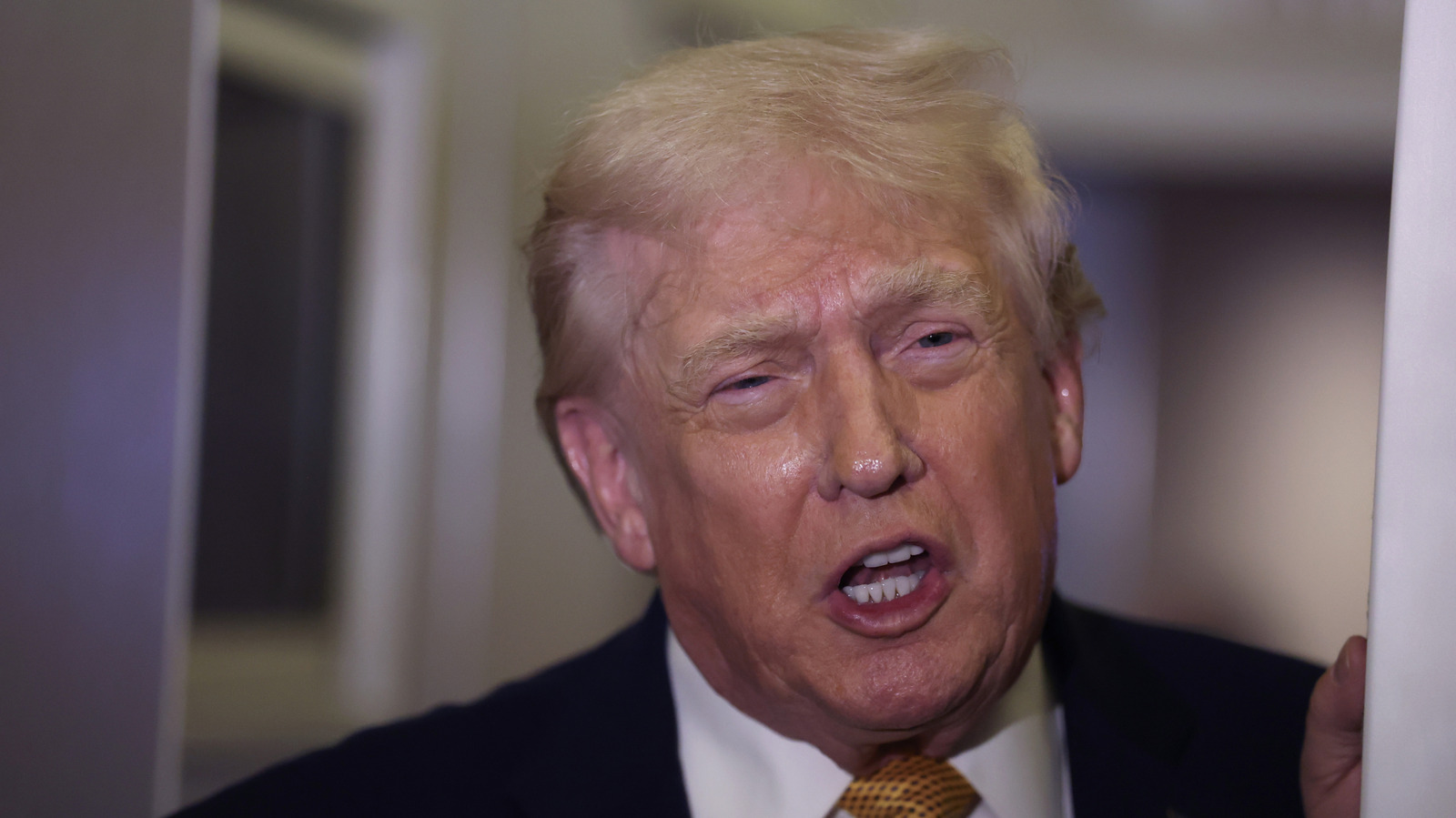 Ghastly New Pic Of Trump At The White House Puts His Bald Spot & Bad Makeup On Blast