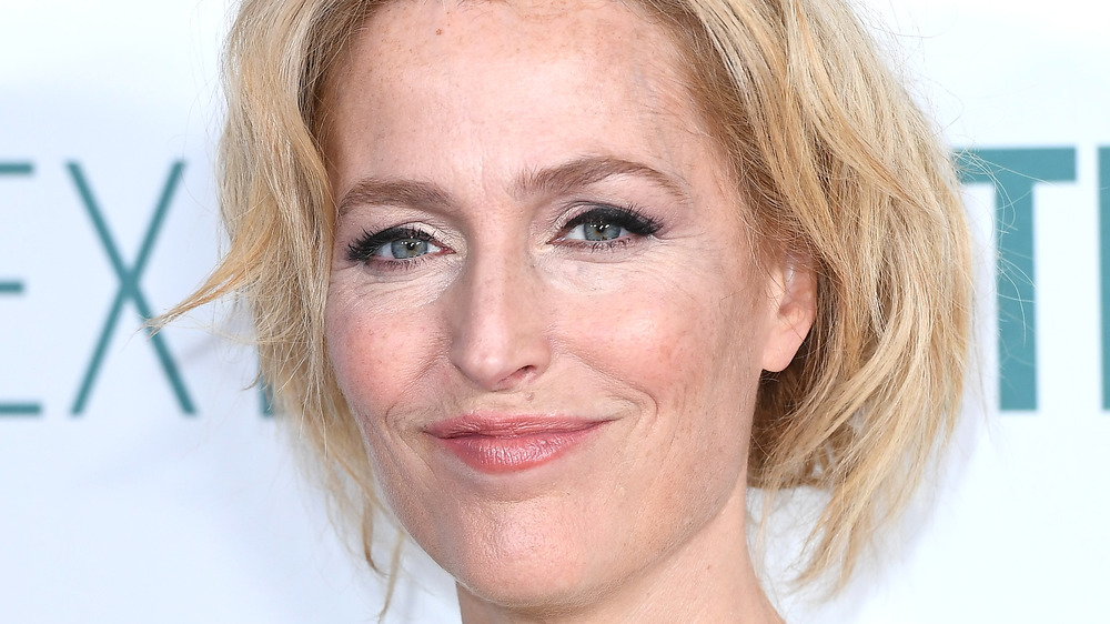 Gillian Anderson smiling on red carpet