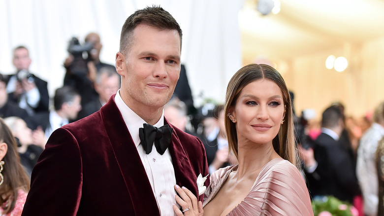 Tom Brady and Gisele Bündchen posing together at the Met Gala