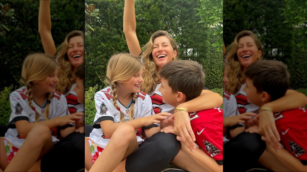 Gisele Bündchen cheers with her kids