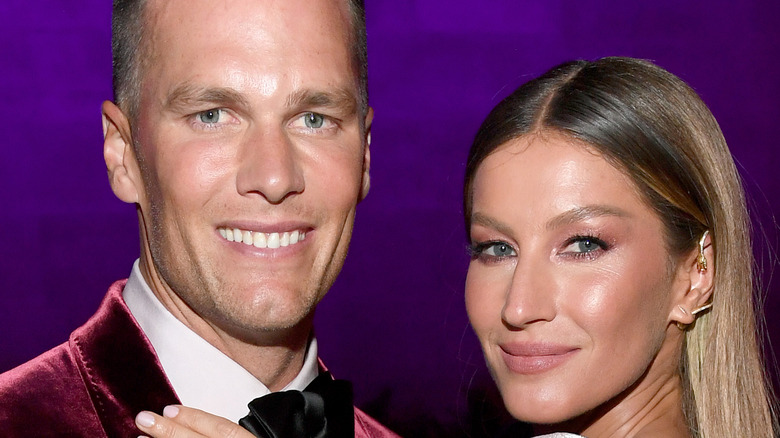 Tom Brady and Gisele Bundchen at an event 