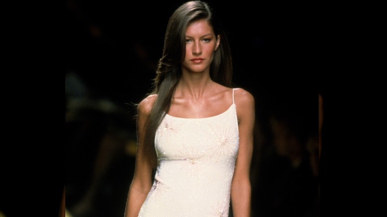 Gisele Bündchen walks the runway in a 1999 fashion show