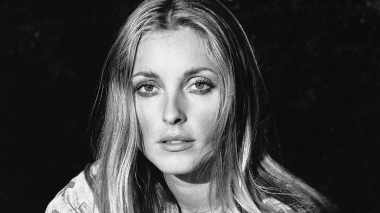 A black and white portrait of Sharon Tate