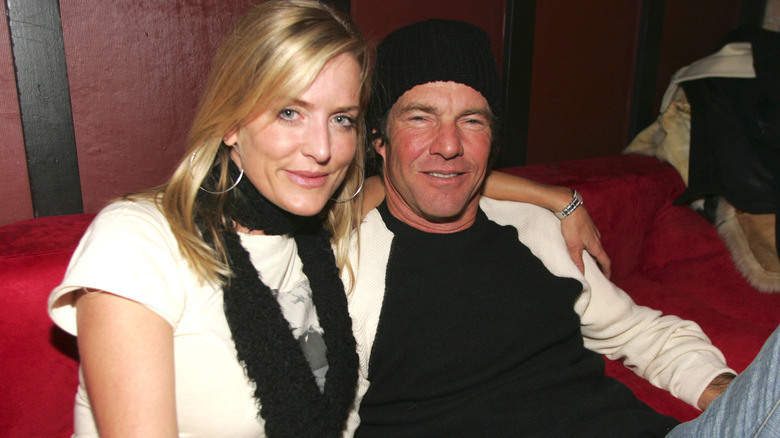 Kimberly Buffington and Dennis Quaid sitting on a couch.
