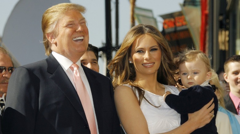 Donald Trump, Melania Trump, and Barron Trump attend the Hollywood Walk of Fame ceremony for Donald (2006)