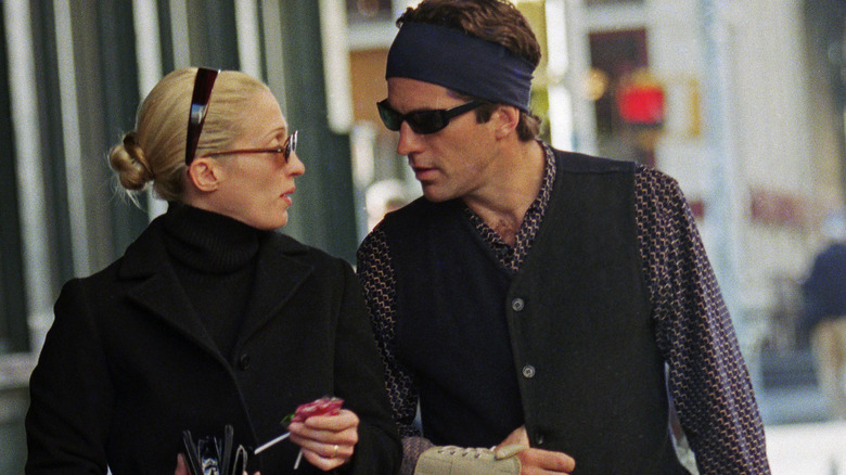 Carolyn Bessette Kennedy cigarette and JFK Jr. hand in brace