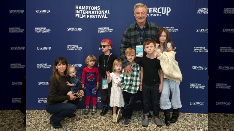 Alec Baldwin and Hilaria Baldwin posing with kids