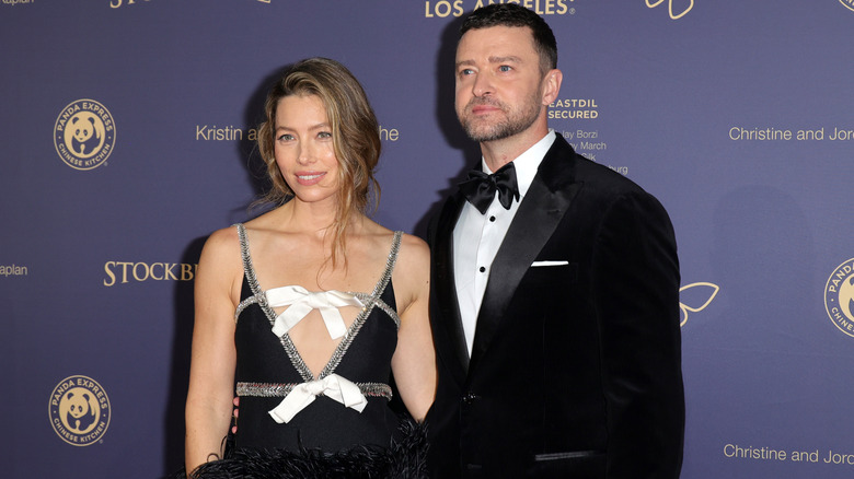 Jessica Biel and Justin Timberlake posing in black outfits