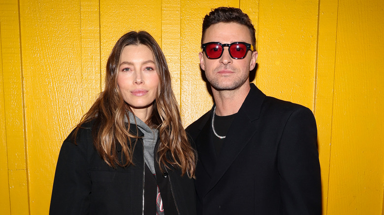 Jessica Biel and Justin Timberlake posing in black outfits together at an event