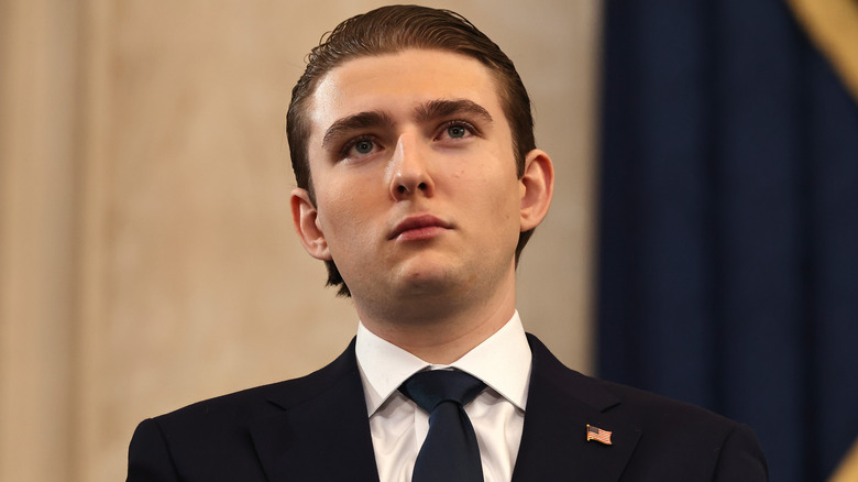 Barron Trump wearing an American flag pin