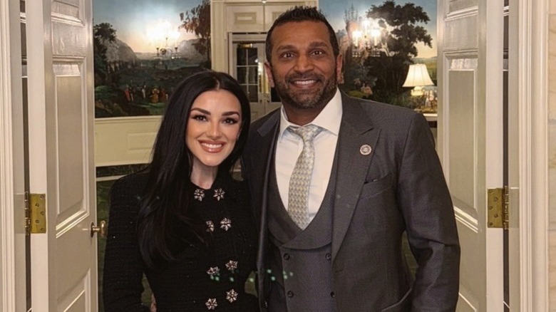 Alexis Wilkins and Kash Patel pose together in the White House in Washington, DC (2025)
