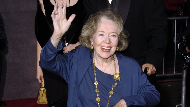 Glynis Johns waving