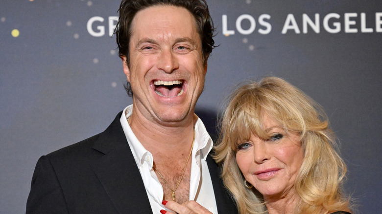 Oliver Hudson and Goldie Hawn posing