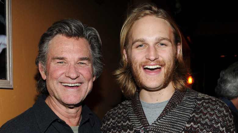 Wyatt and Kurt Russell smiling together in 2014