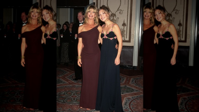 Goldie Hawn and Kate Hudson pose with arms around each other