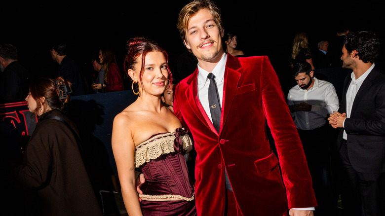 Millie Bobbie Brown and Jake Bongiovi waist-up