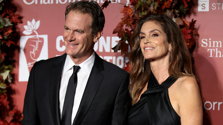 Cindy Crawford smiling with Rande Gerber