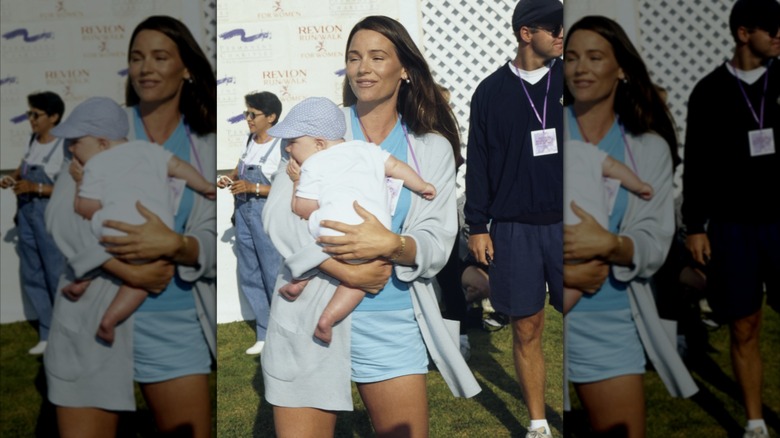Keely Shaye Smith holding her infant son Dylan Brosnan