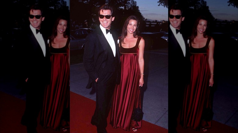 Pierce Brosnan laughing next to a smiling Keely Shaye Smith