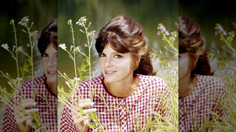 Katharine Ross photographed in a pastoral setting in the '60s