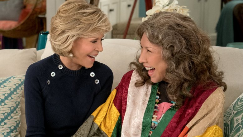 Lily Tomlin and Jane Fonda on a couch in Grace and Frankie