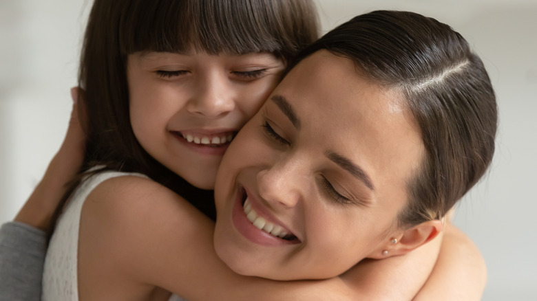 young mom holding child