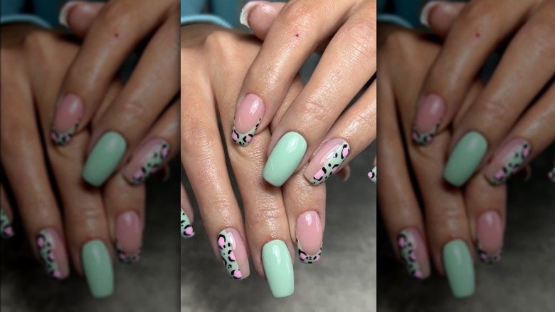 Nails with mint green and pink cheetah print polish