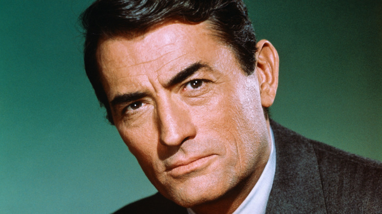 Gregory Peck close up green background