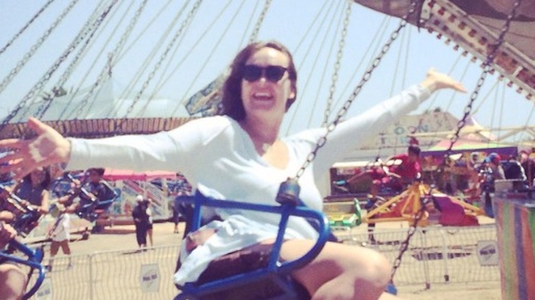 Marisa Peck Johnson on a carnival swing ride