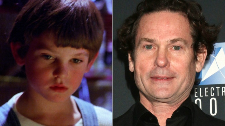 A split image of Henry Thomas acting in ET and today