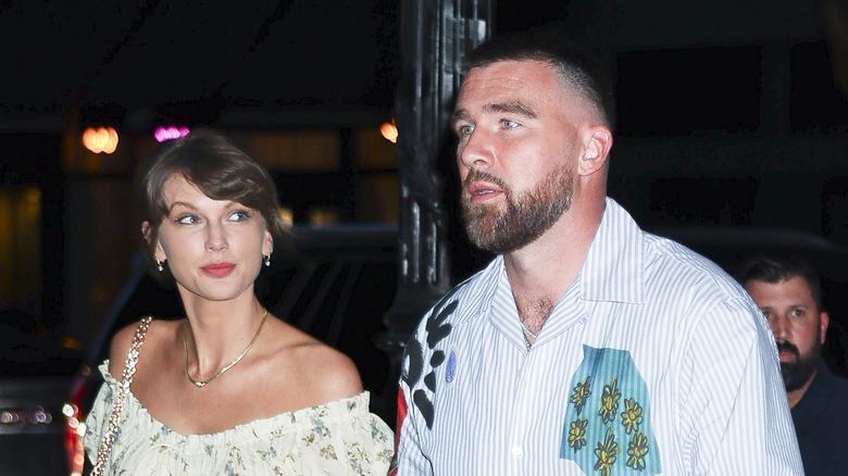 Taylor Swift looking at Travis Kelce