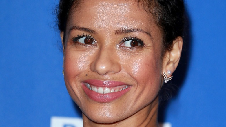 Gugu Mbatha-Raw smiling red carpet