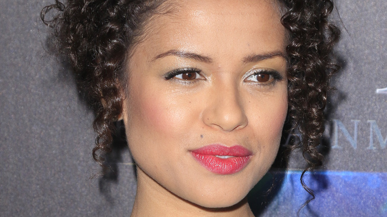 Gugu Mbatha-Raw smiling curly hair