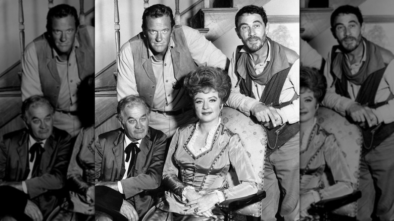 The star-studded cast of "Gunsmoke" pose for a picture