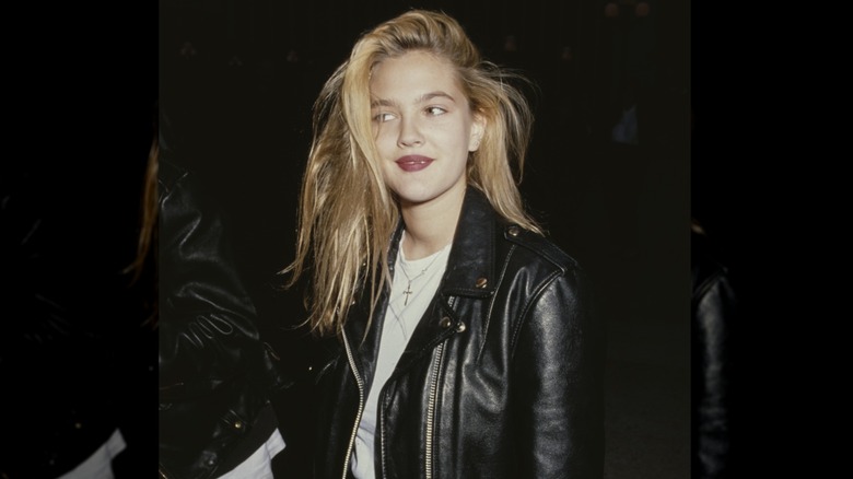 Drew Barrymore attends a movie event in 1990