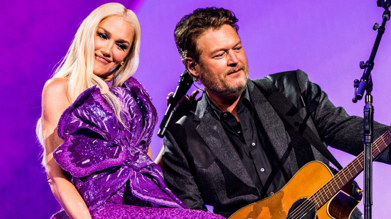 Gwen Stefani and Blake Shelton performing onstage together