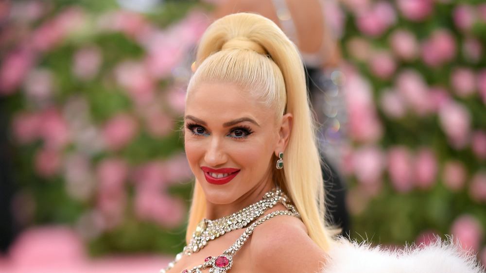 Gwen Stefani smiling with ponytail