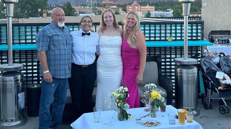 David Woolley, Beatriz Queiroz, Gwendlyn Brown and Çhristine Brown posing at Gwendlyn's wedding