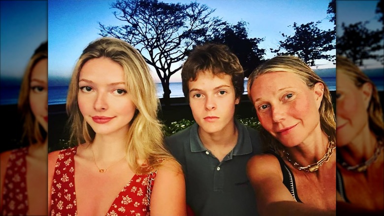 Apple Martin, Moses Martin, and Gwyneth Paltrow taking a selfie outside