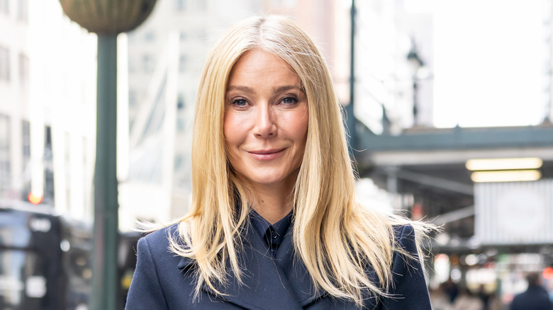 Gwyneth Paltrow photographed on a city street with a navy coat