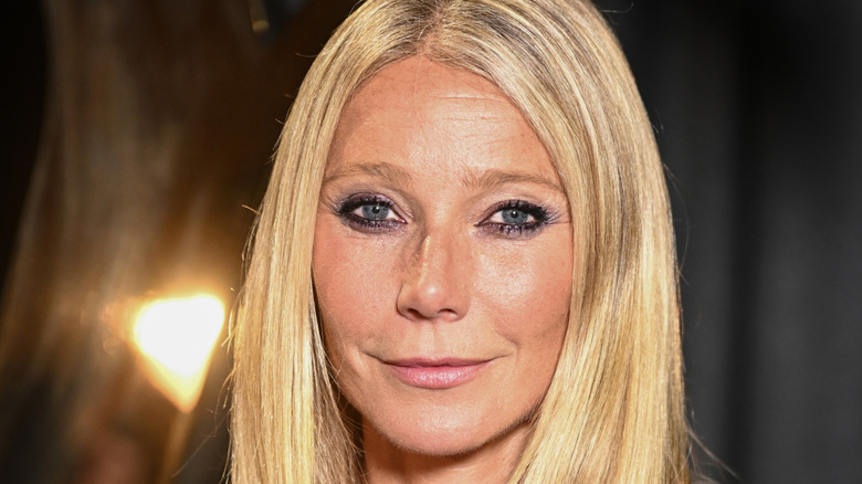 Gwyneth Paltrow posing at an event with her hair down