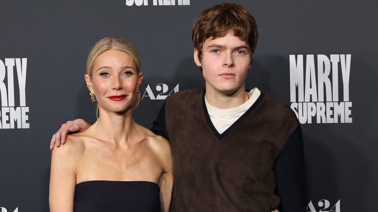 Gwyneth Paltrow and Moses Martin posing together at a Marty Supreme screening