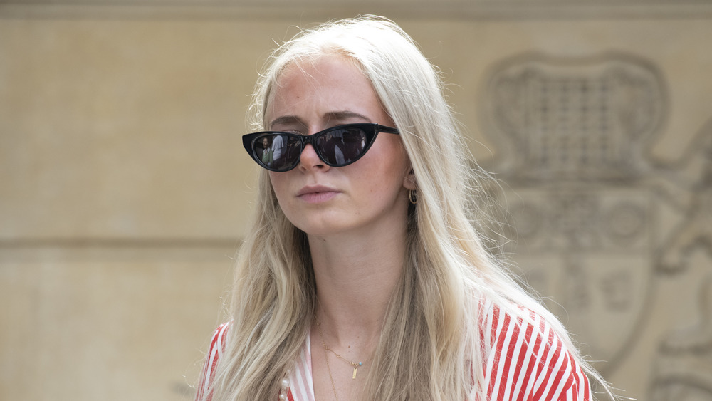 A woman with pearl blonde hair